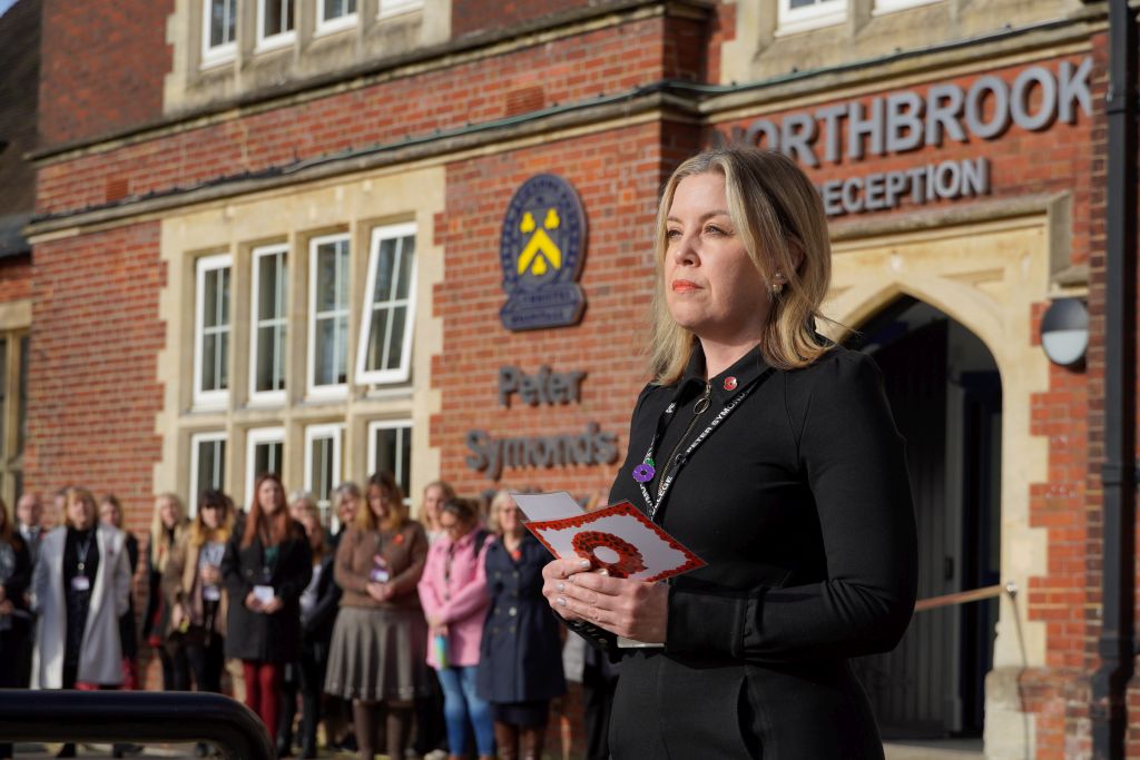 Principal Sara Russell commemorates the fallen by reading The Kohima Epitaph Principal Sara Russell commemorates the fallen by reading The Kohima Epitaph